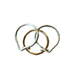 Gold and silver interlocking stacking puzzle rings made from 14K gold filled and Argentium silver