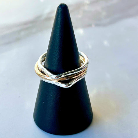Gold and silver interlocking stacking puzzle rings made from 14K gold filled and Argentium silver